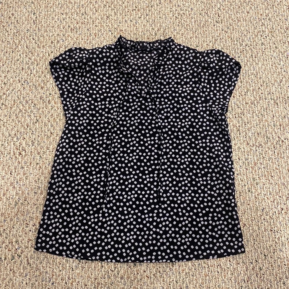 Size M floral print work blouse. V neckline with two string that can be tied.